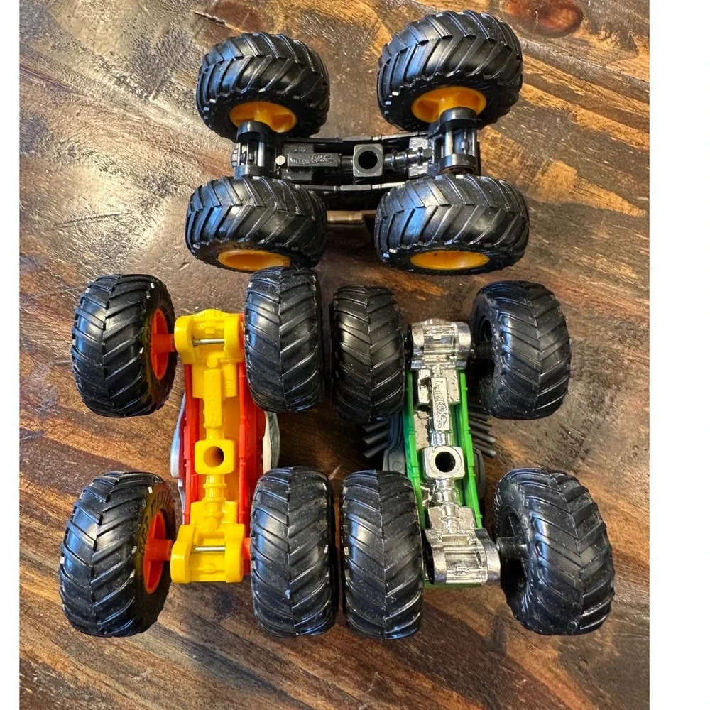 Monster Jam Truck HotWheel Lot of 3 1:64  Rhinomite Jurassic World Radical Racer